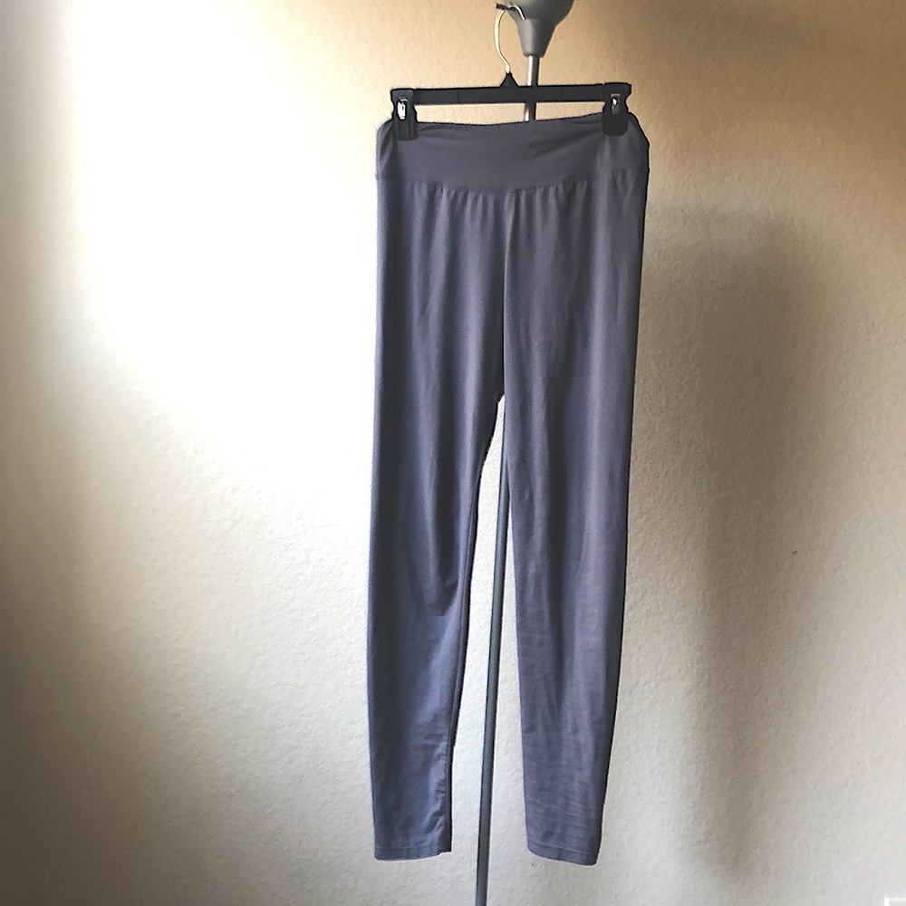 Light grey, thin, buttery soft leggings.